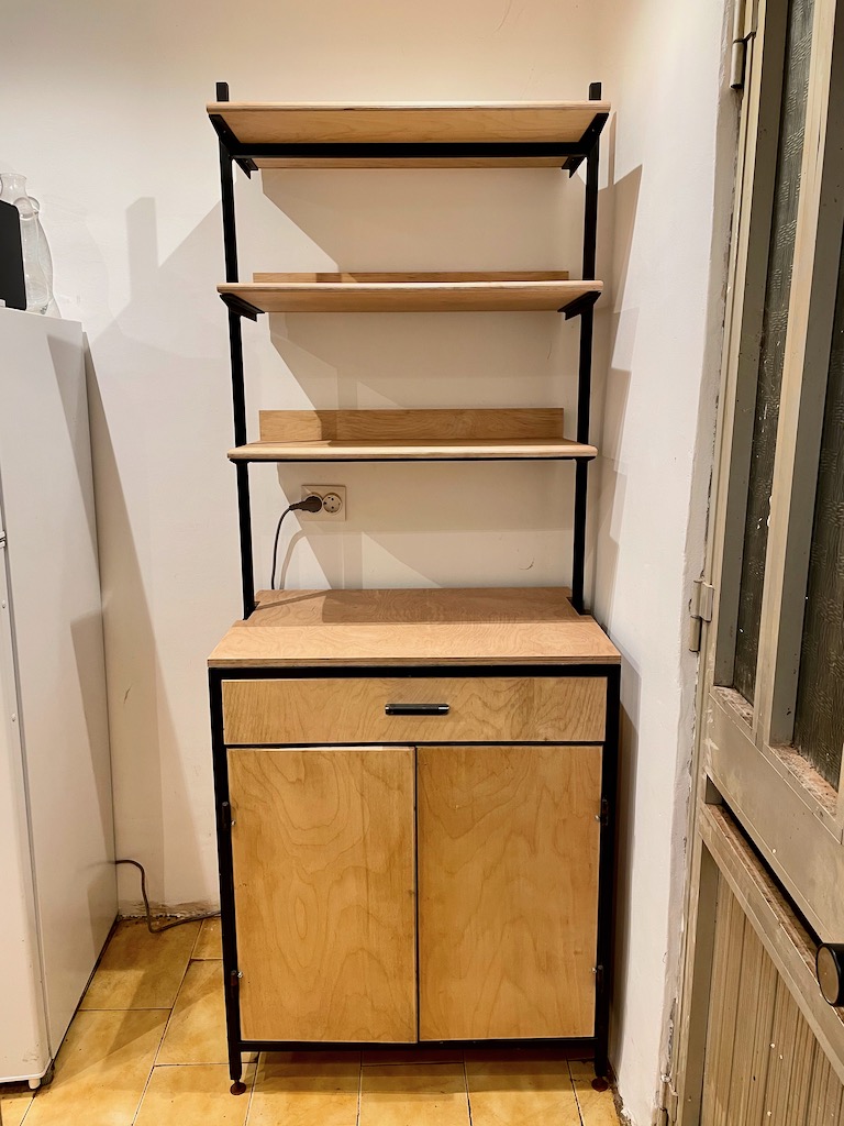 A kitchen cabinet for a farmhouse.