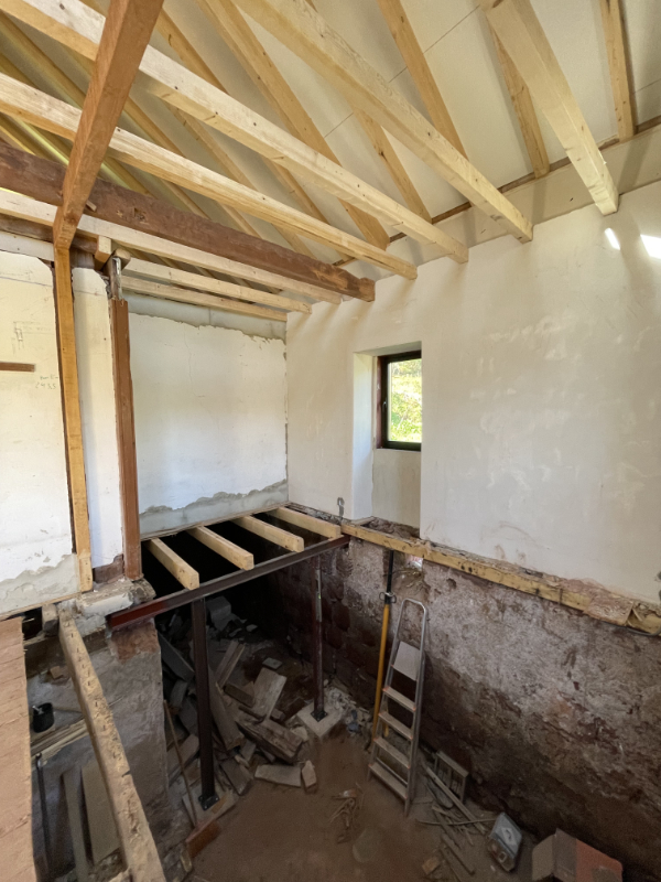 Wooden floors and lime-plastered walls.